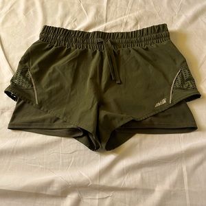 Green active wear shorts